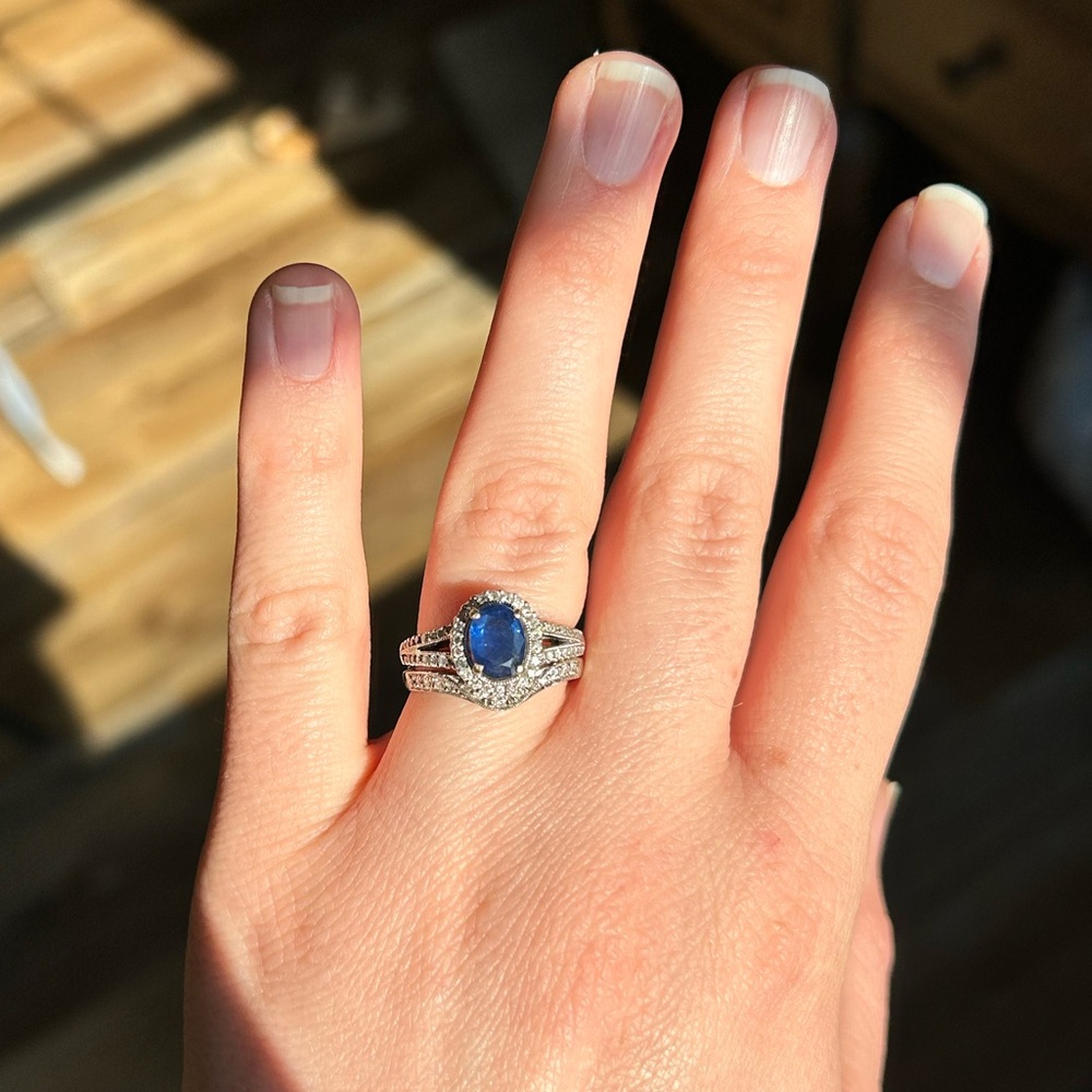 Blue sapphire and diamond engagement ring with wedding band